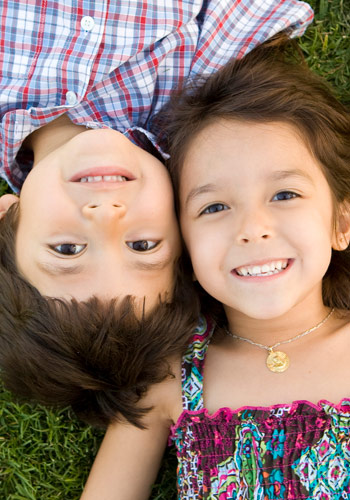 Happy children who are safe, secure and covered by life insurance.